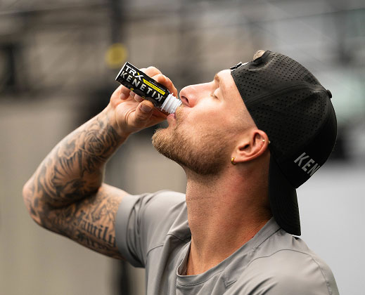 Six-pack of TRX KENETIK ketone shot bottles.
