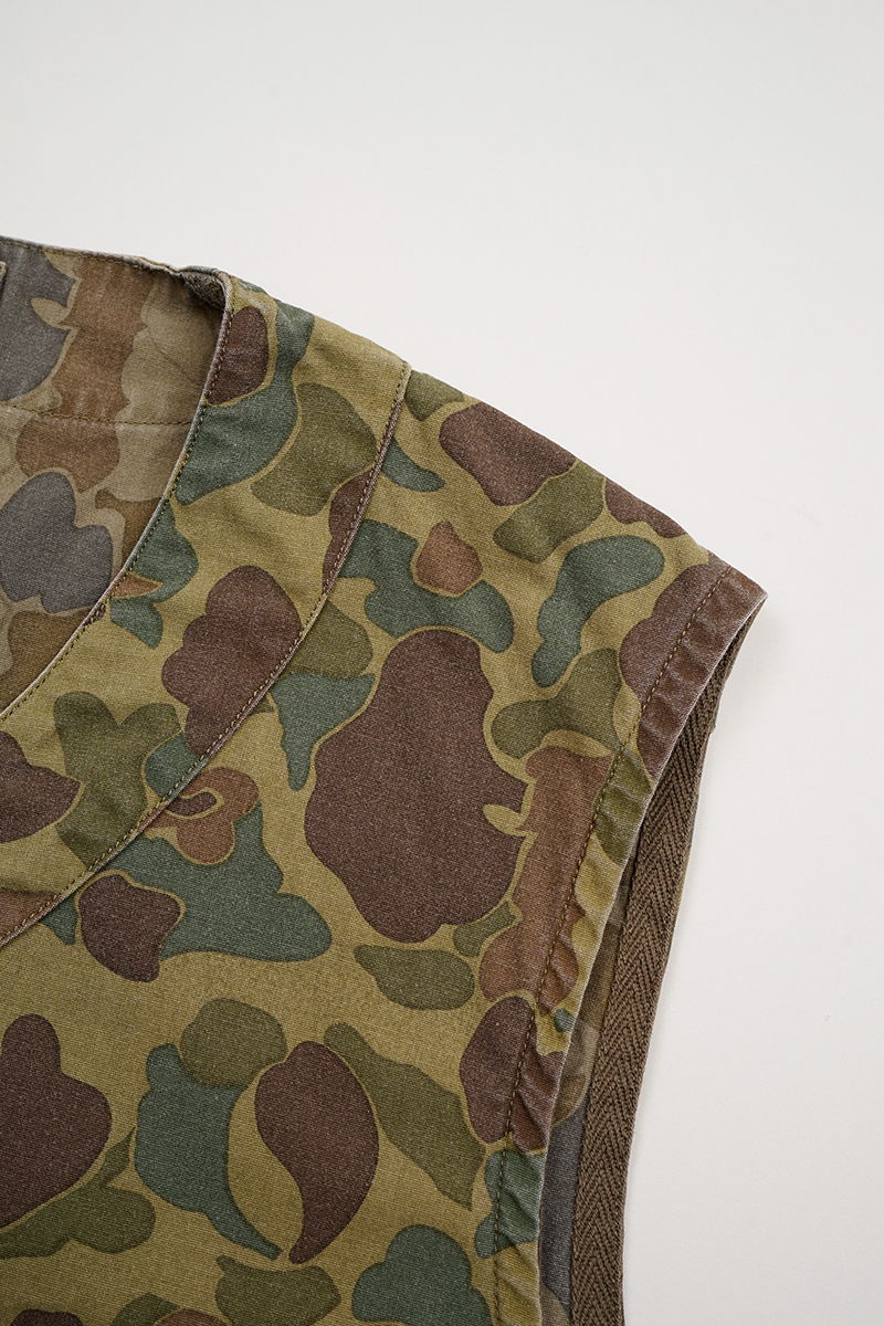 A close-up of a camouflage-patterned fabric edge.