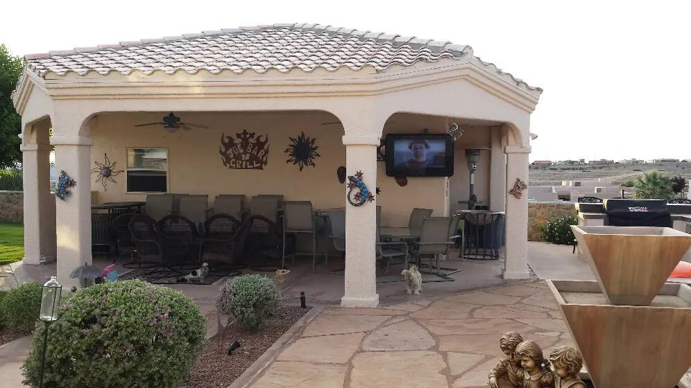 TV in weatherproof TV box, The TV Shield, on bar and grill patio