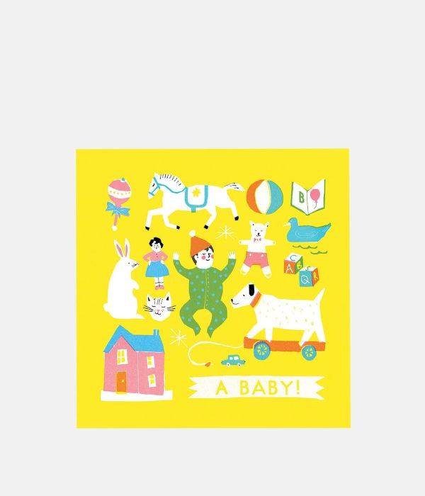 A New Baby card with yellow background and illustrations of baby toys. 