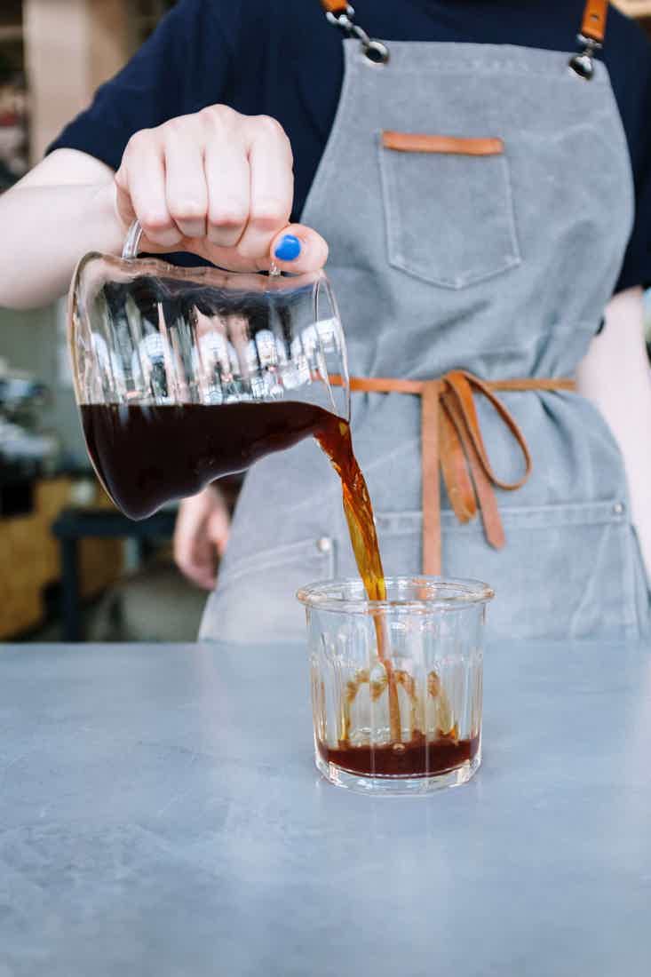 Woman pouring coffee