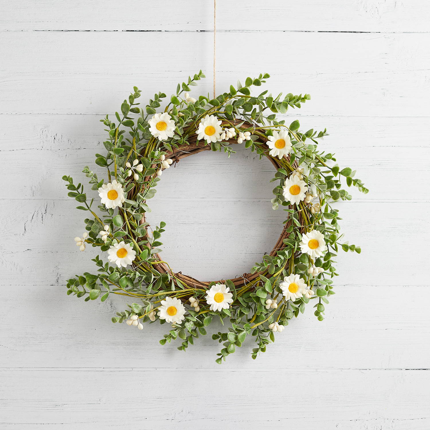 Artificial floral wreath