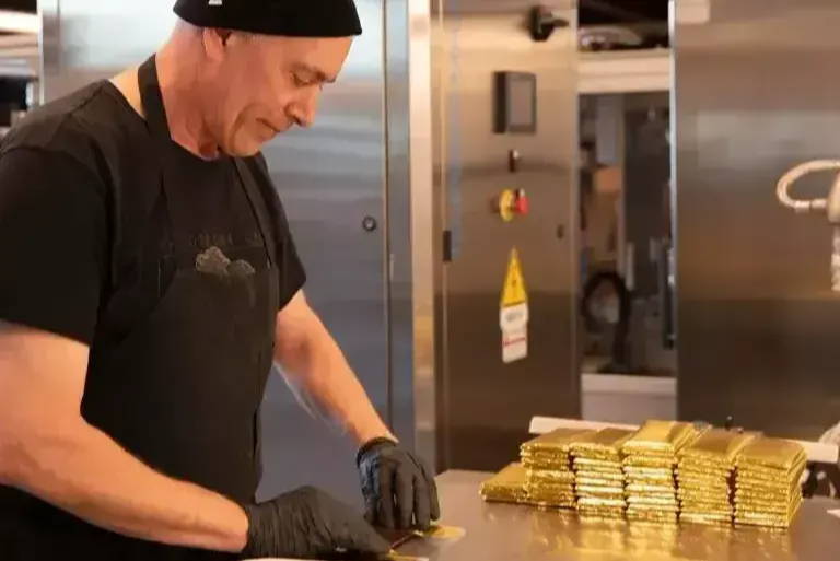 David foils chocolate bars at the 16th Street Factory