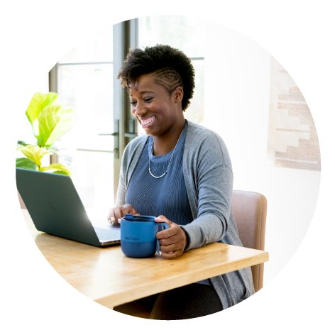 Rise Coffee mug and girl on laptop