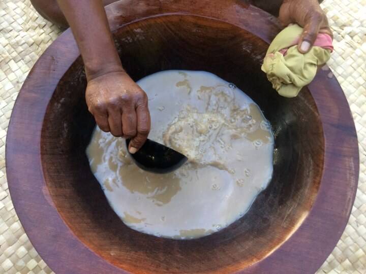 Scooping Kava from a Tanoa