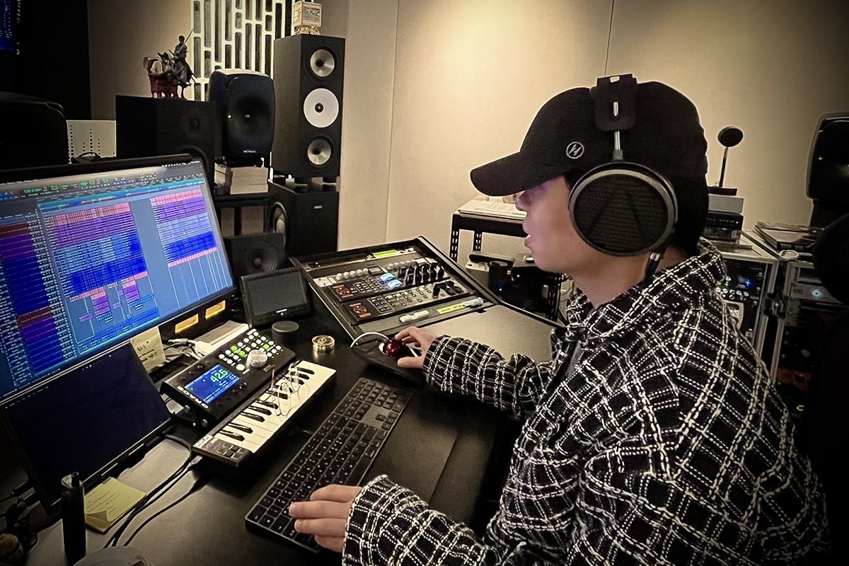 JongPil Gu wearing Audeze MM-500 headphones in the studio