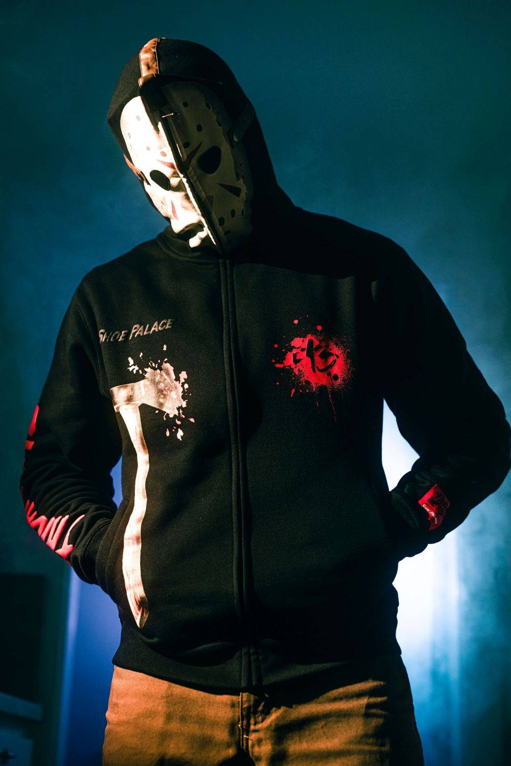sp x friday the 13th model wearing black jacket and Halloween mask