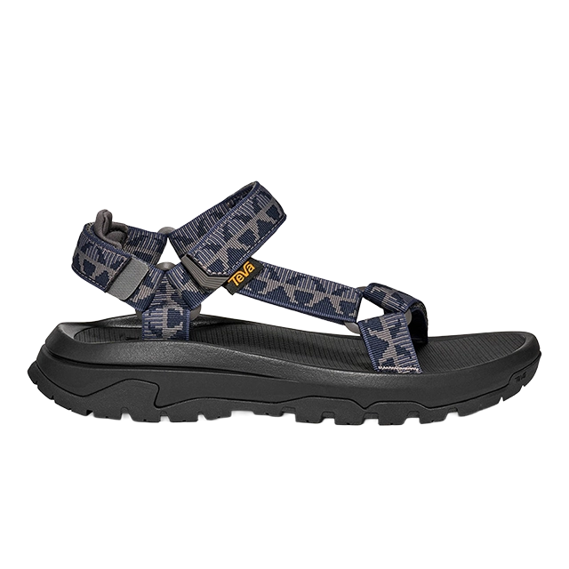 Navy blue hiking sandal with adjustable straps and textured sole.