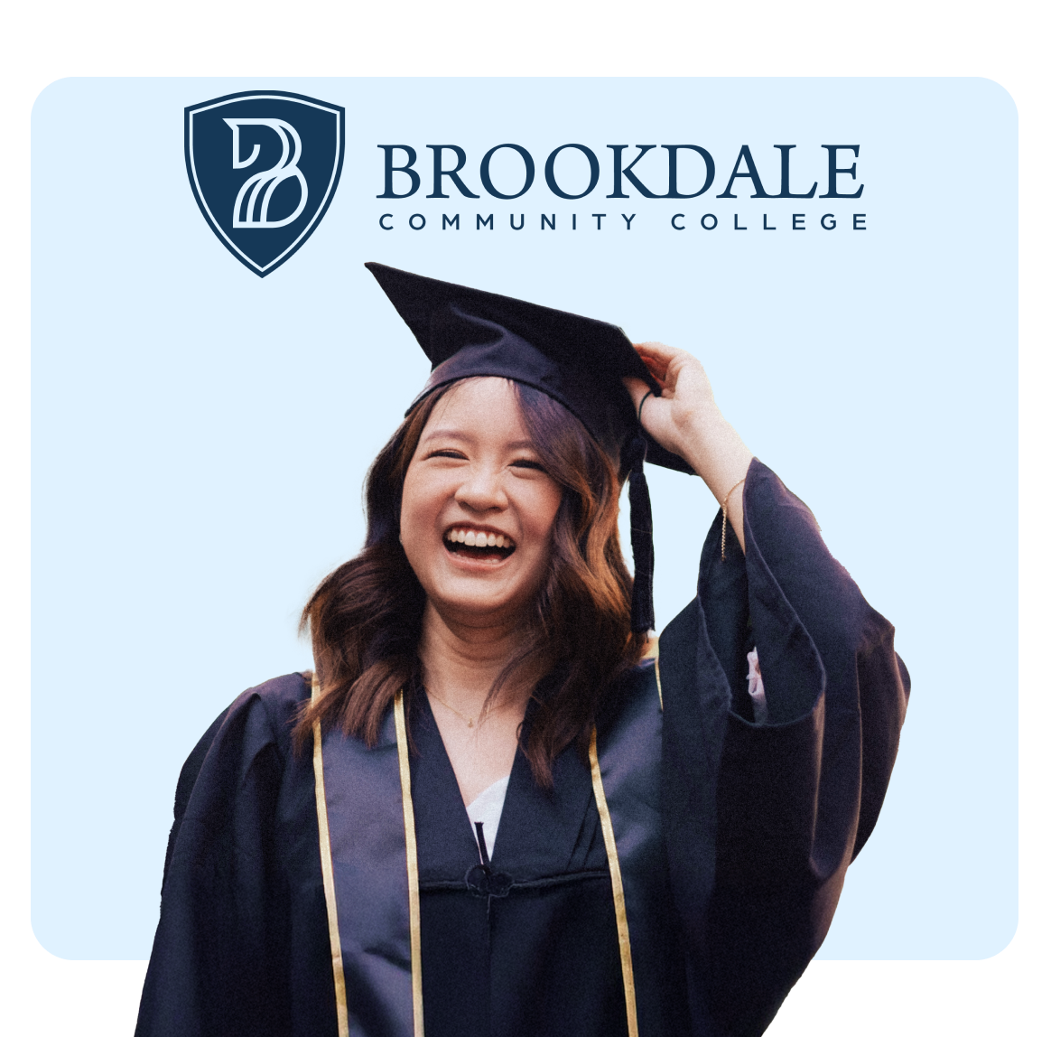 Happy graduate celebrating at Brookdale Community College.