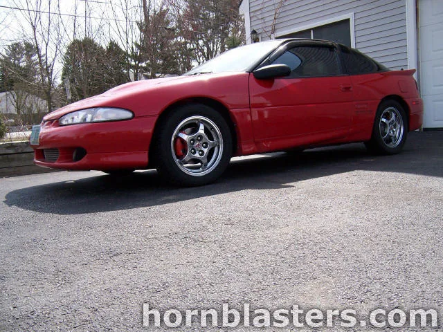 Front-three-quarter Chad's 1992 Eagle Talon DSM liftback exterior pop-up headlights grille bumper Shocker XL train horn featured customer install photo 1