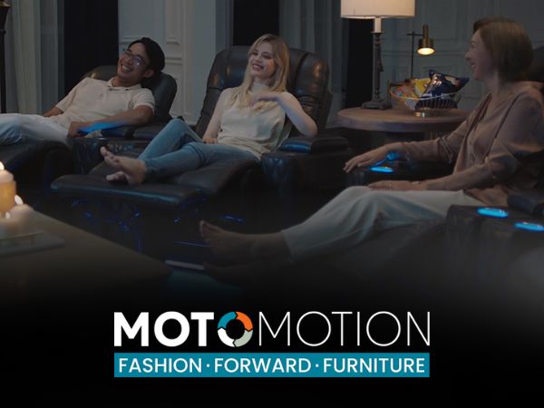 Three people relaxing in stylish moto motion recliners with a lamp in the background.