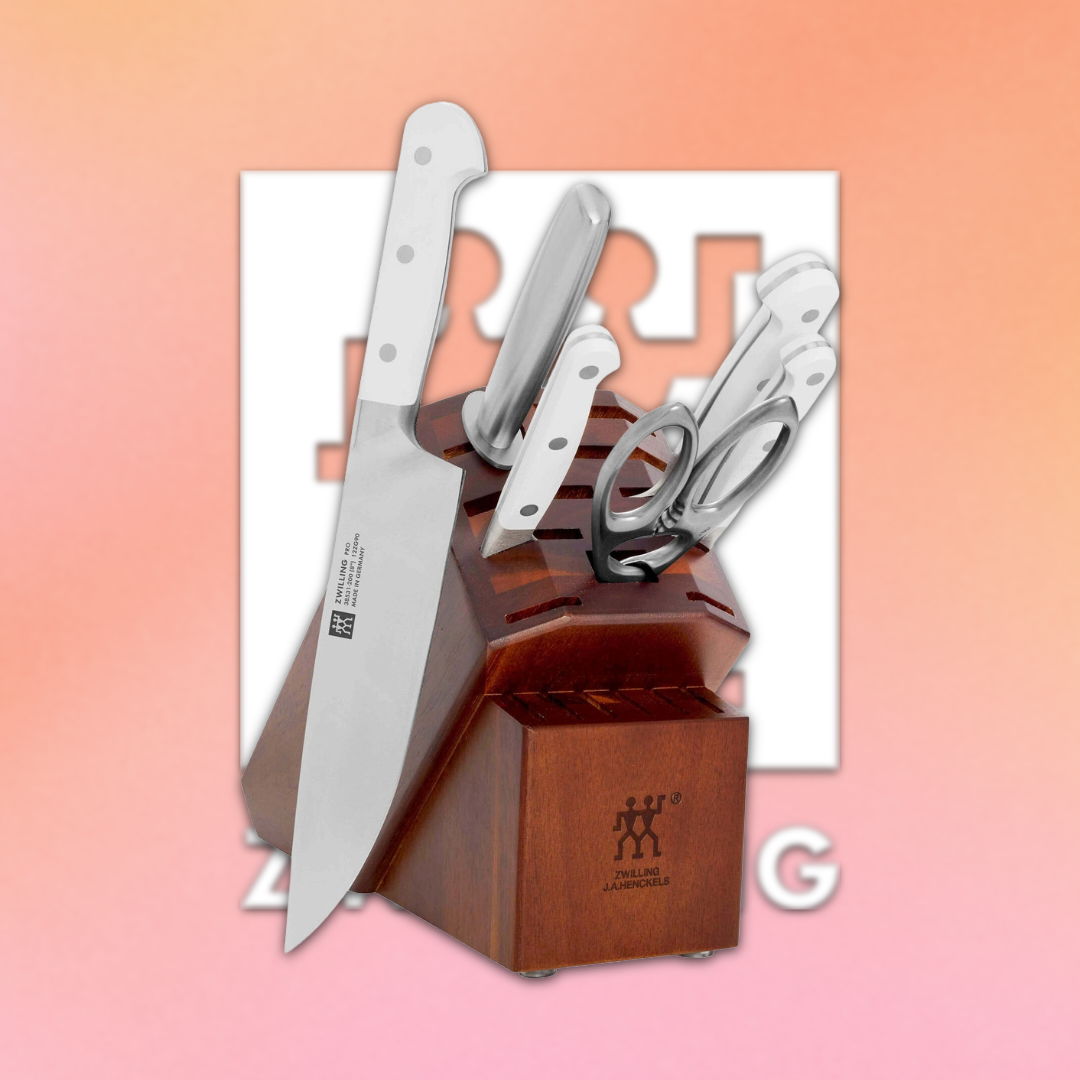 Knife block set with several kitchen knives on a gradient background.