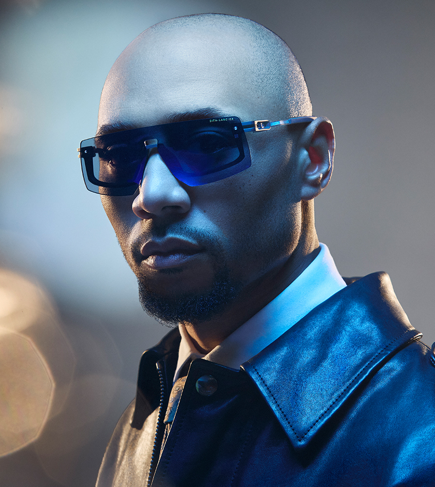 MLB Superstar Mookie Betts wearing sunglasses and a beanie, with a chain necklace.