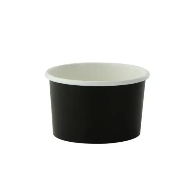 A small black paper sauce container