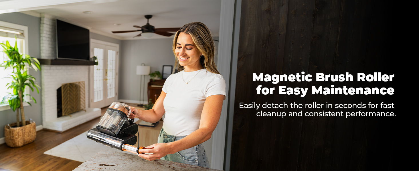 Woman demonstrating a magnetic brush roller in a modern kitchen setting.