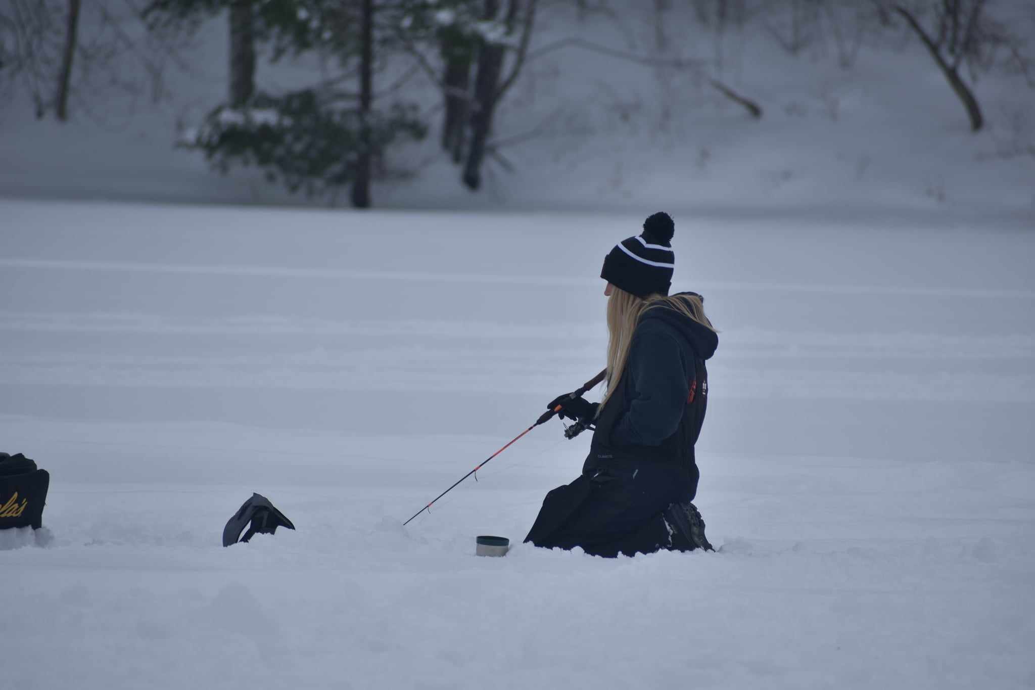 Pro-Staffer Amy Hansen jiggin for catfish on the ice