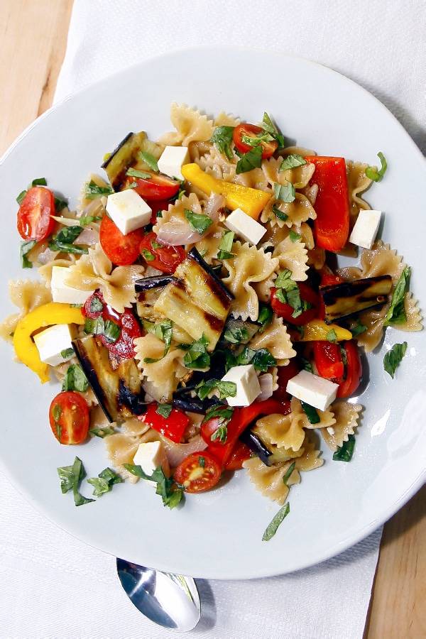 Farfalle pasta with peppers, eggplant and mozzarella cheese