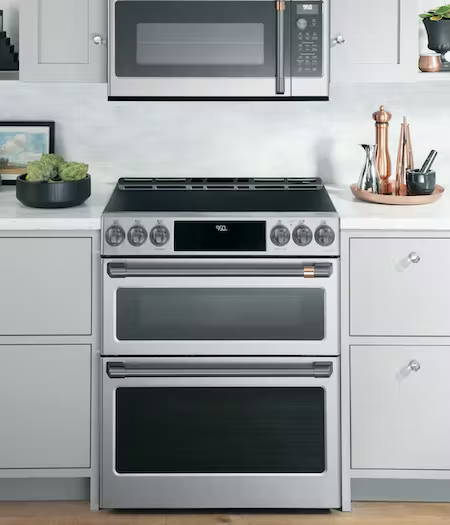 stainles slide in electric range with brushed black hardware