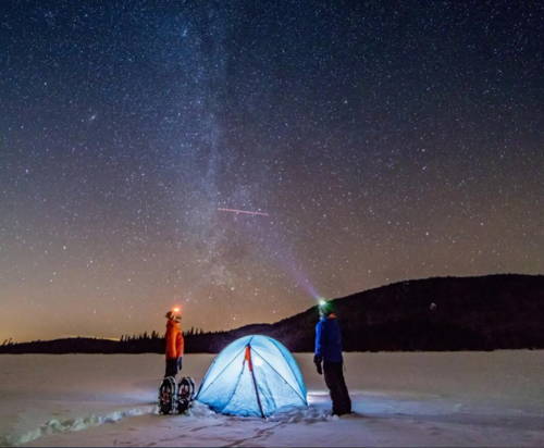 Two people stargazing