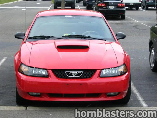 Exterior three-quarter view of 2003 Ford Mustang with HornBlasters Shocker XL train horn featured customer install gallery photo 1