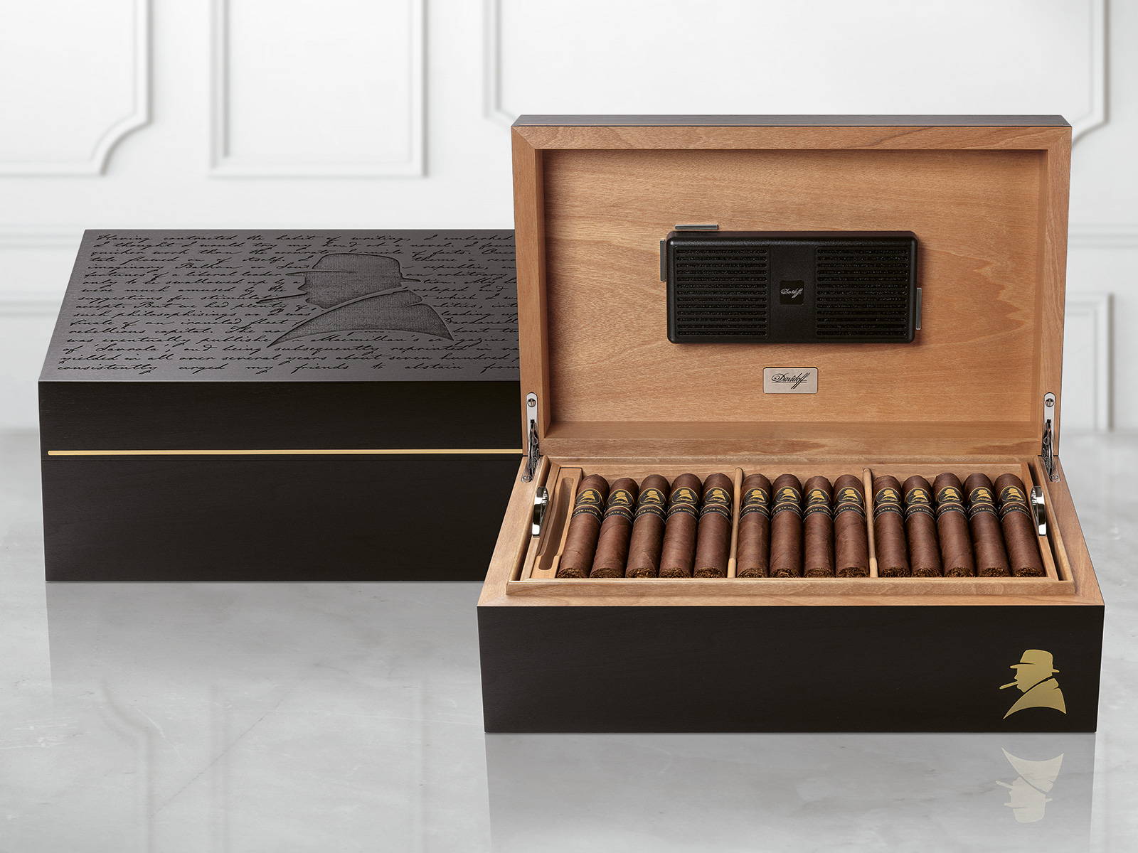 3. Opened Davidoff Winston Churchill Ambassador Humidor with «The Late Hour Series» cigars inside next to another closed humidor.