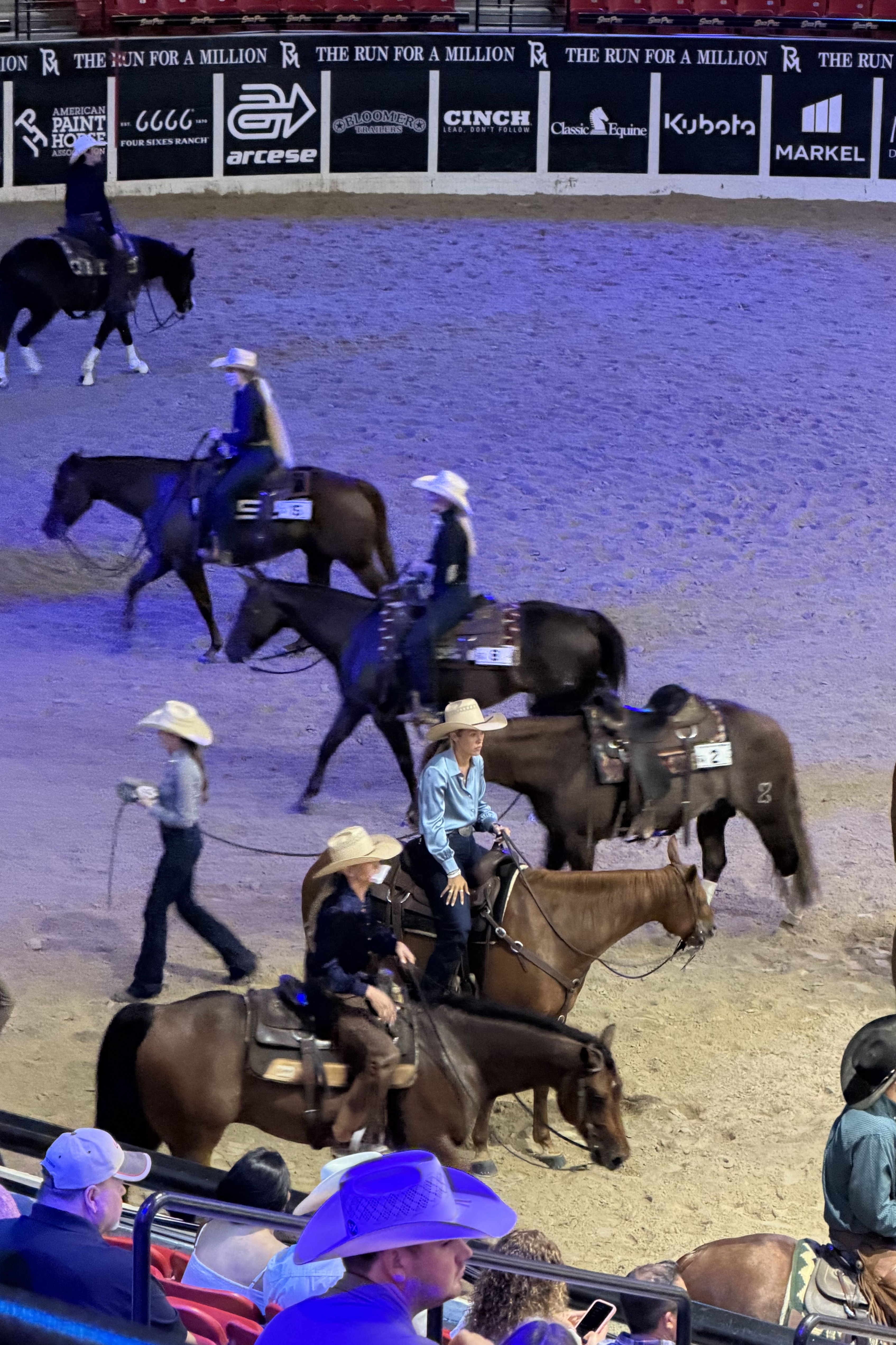 Kylie and Elizabeth in the cutting arena waiting to compete. 
