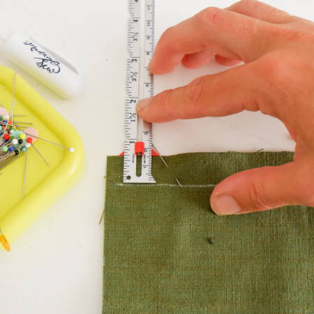 Measuring the mark for the seam allowance with a seam gauge