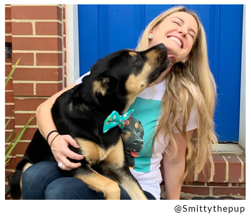 dog kissing mom
