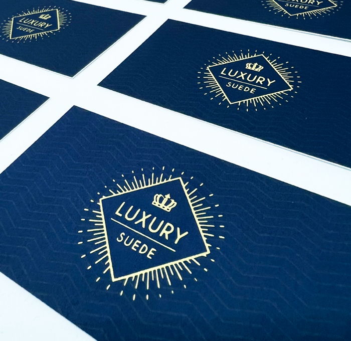 Suede laminated business cards on a soft touch laminated card stock