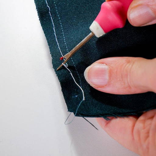 remove basting stitches with a comfort handle seam ripper