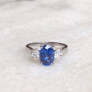 blue sapphire three stone engagement ring 