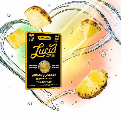 Lucid cannabis product packaging with pineapple slices and bubbles in a vibrant background.