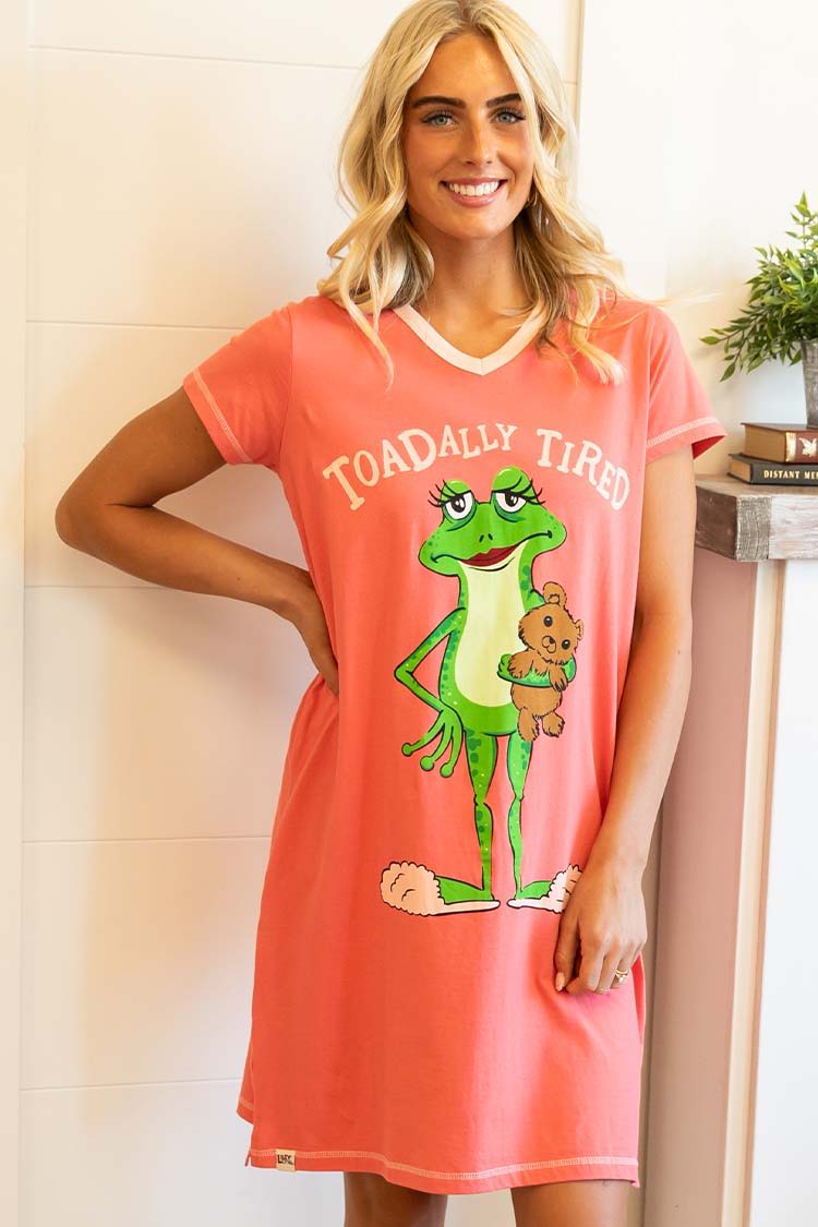 woman wearing a frog themed v neck nightshirt