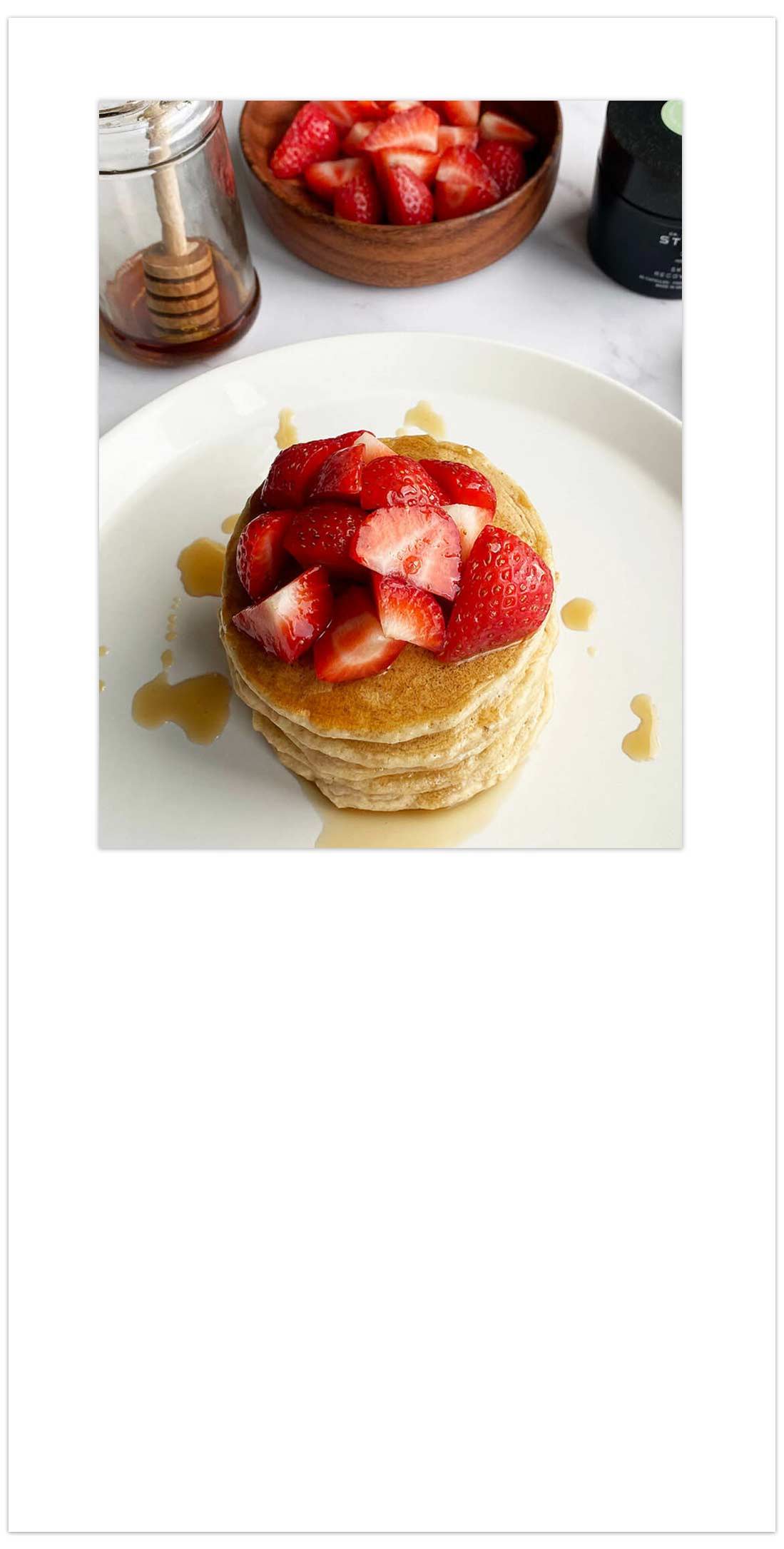 PANCAKES WITH STRAWBERRIES ON TOP