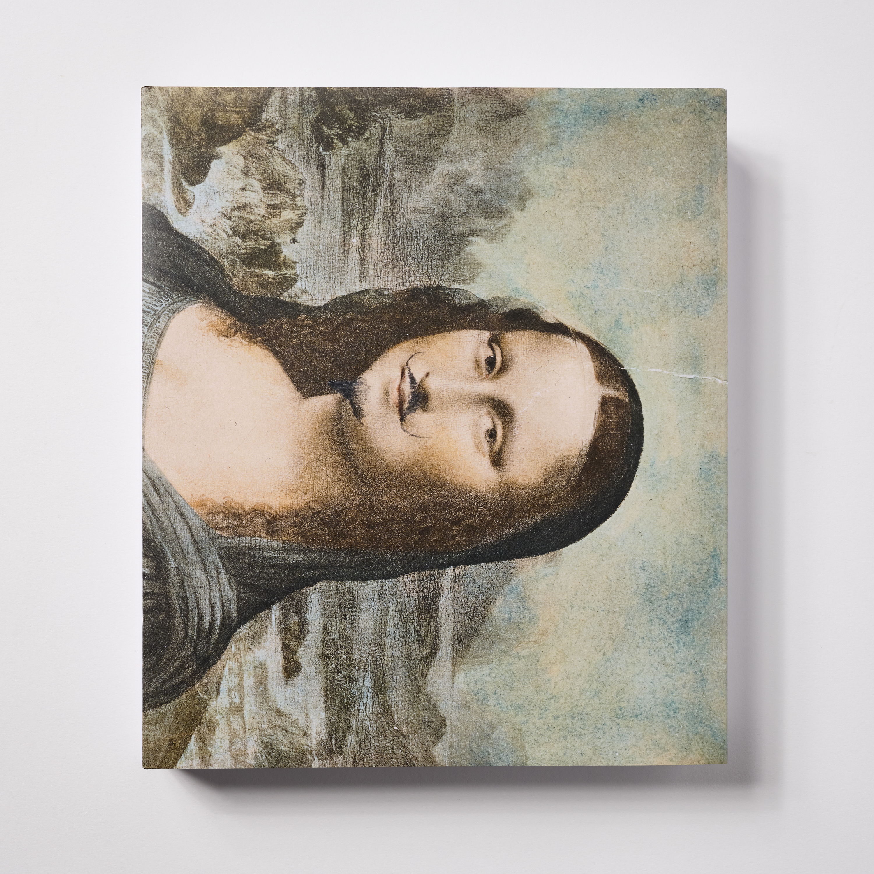 A classic painting of a woman with a serene expression and background landscape.
