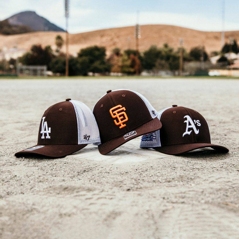 sp x '47 brand trucker hats on baseball field