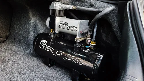 Wide shot of finished Conductor's Special 228H train horn kit install on Liza's 2017 Mustang GT HornBlasters gallery photo 5