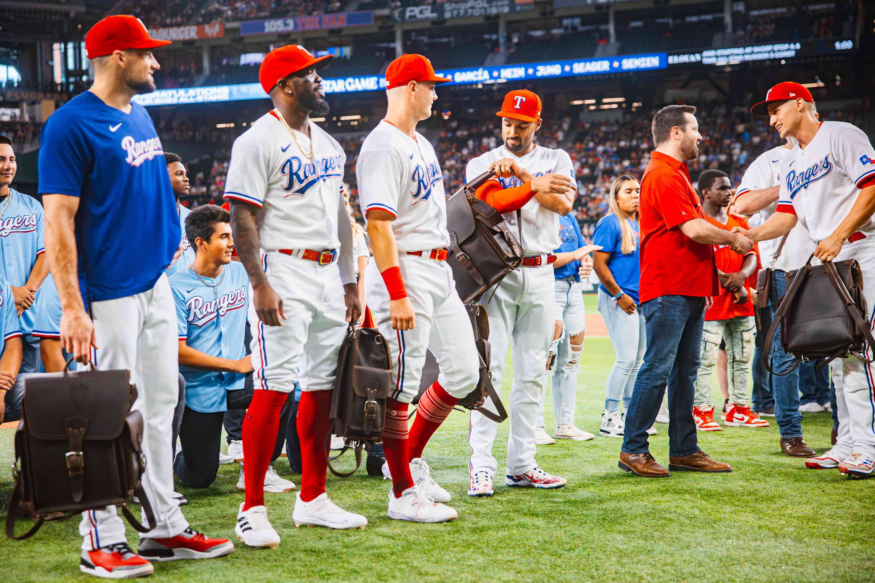 Texas Rangers All-Stars with Tank Leather Backpacks.