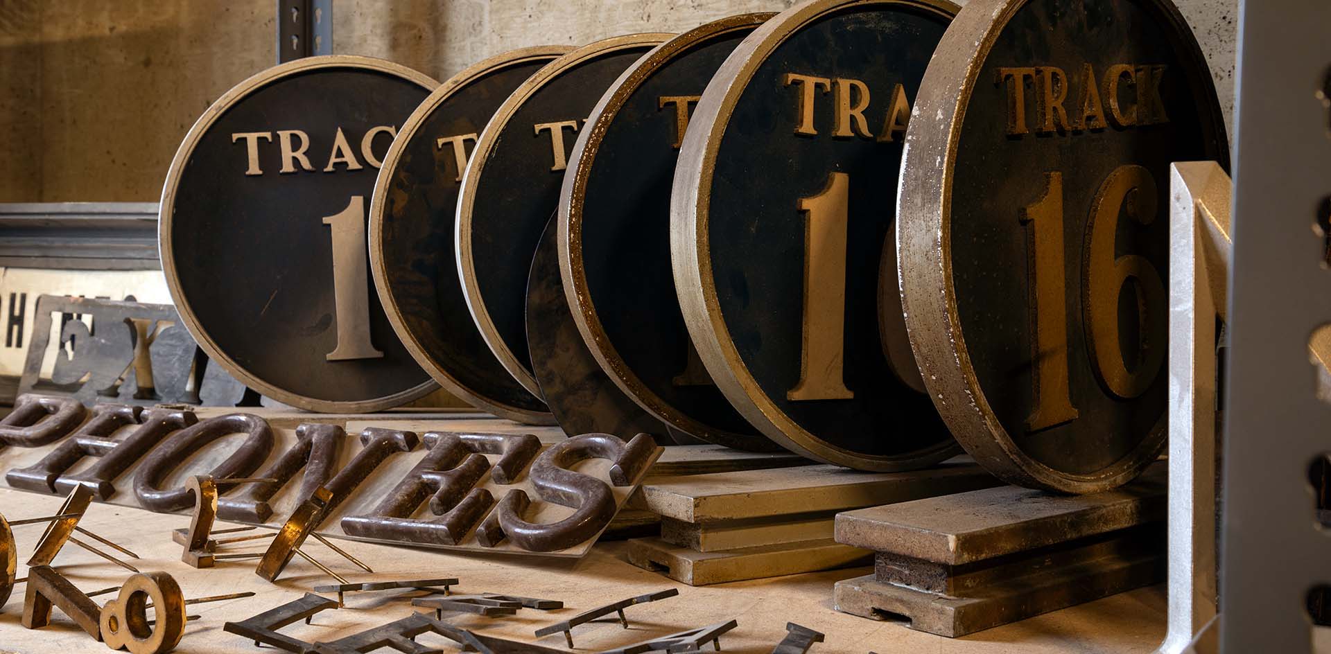Retired track signage and other wayfinding signage from Los Angeles' Union Station.