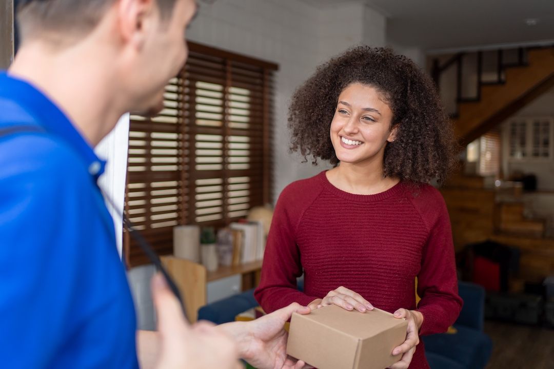 what success looks like - smiling customers receiving their packages