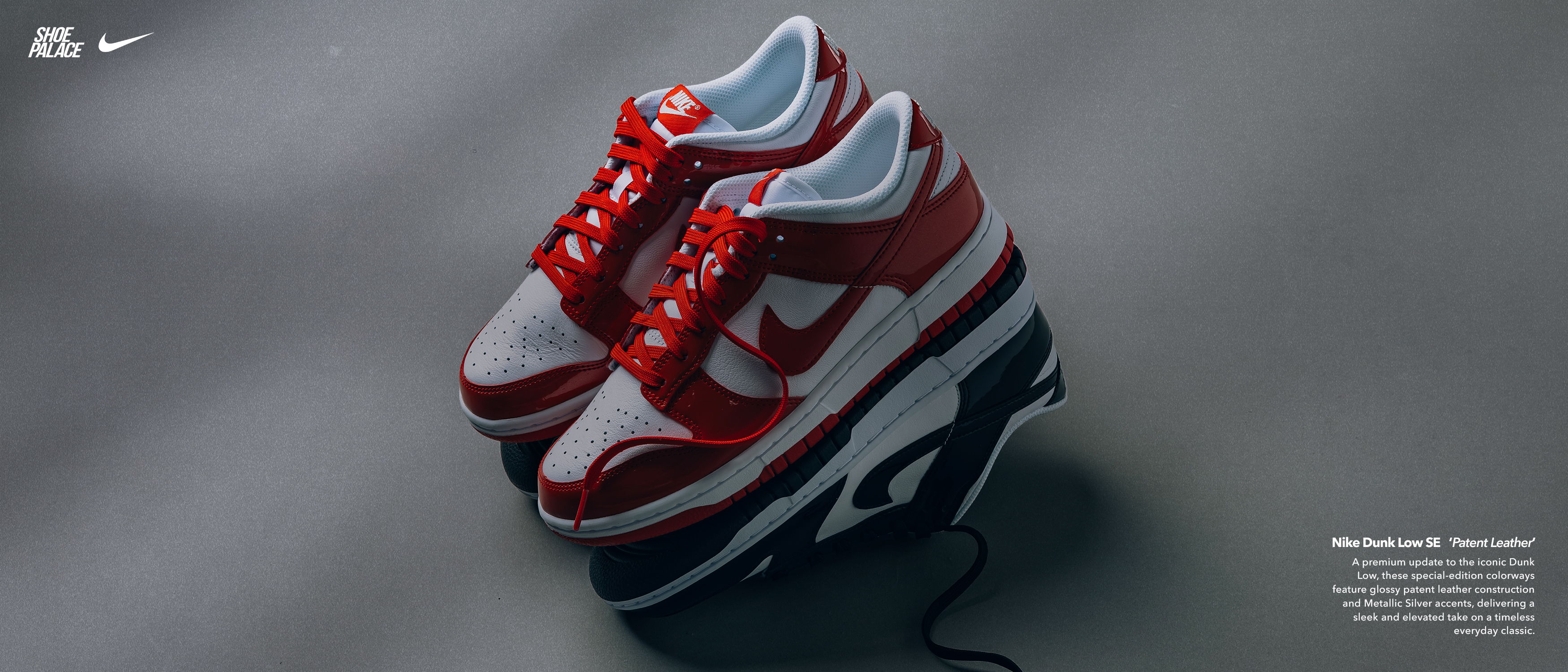 Red and white Nike sneakers displayed on a gray background.