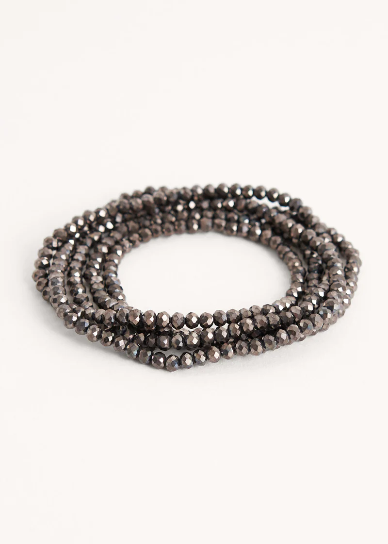 A necklace made from bronze, sparkly crystal beads