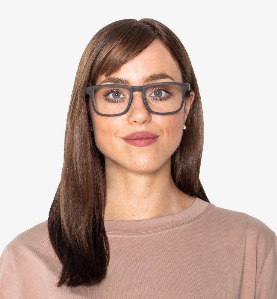 Woman wearing Bold Black, Rectangle Thick Frame Glasses in Oak Wood