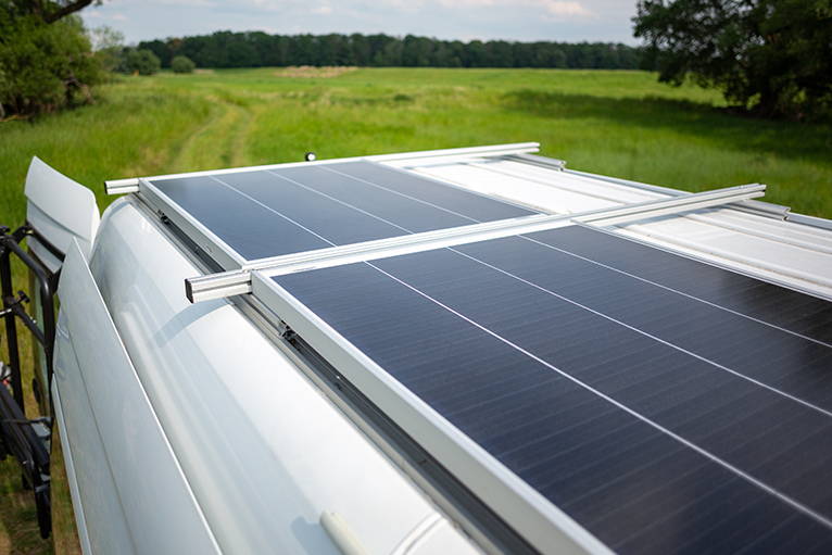 Campervan with solar panels on the roof