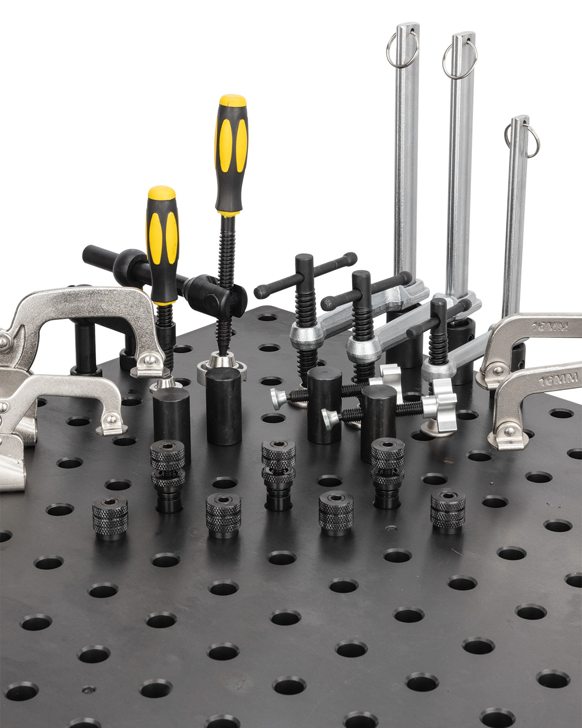 Various tools arranged on a perforated black workbench surface.