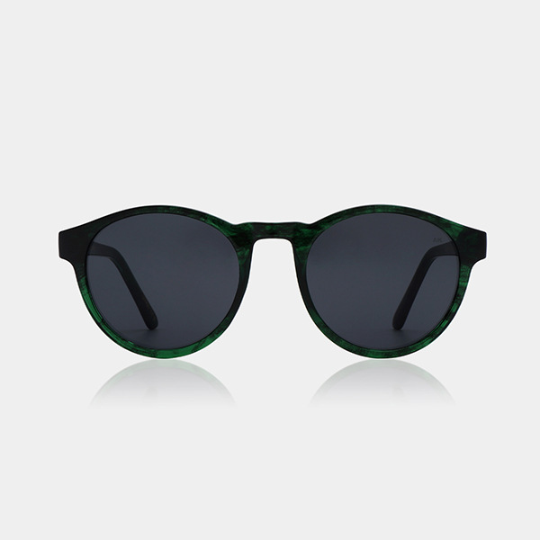 A product image of the A.Kjaerbede Marvin sunglasses in Green marble Transparent.