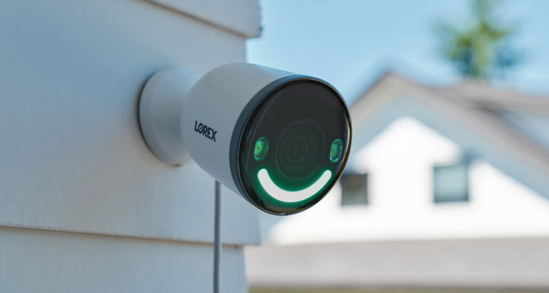 Lorex 4K Wi-Fi Camera with Smart Security Lighting on Exterior Wall