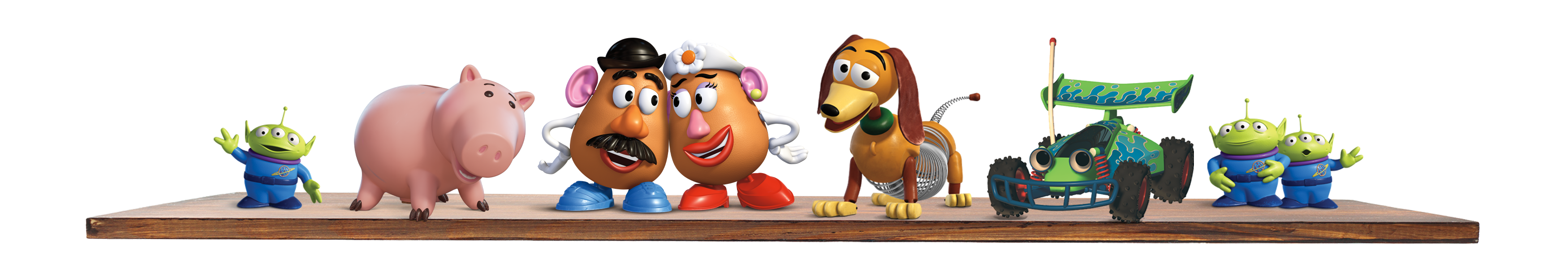 Toy characters from a popular animated movie series on a wooden surface.