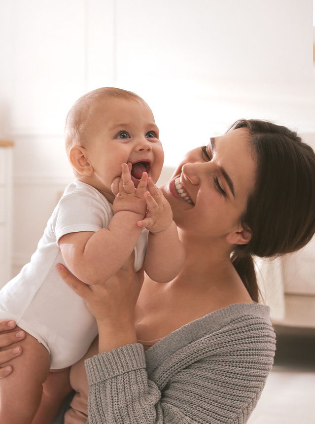 Mother Kissing Baby
