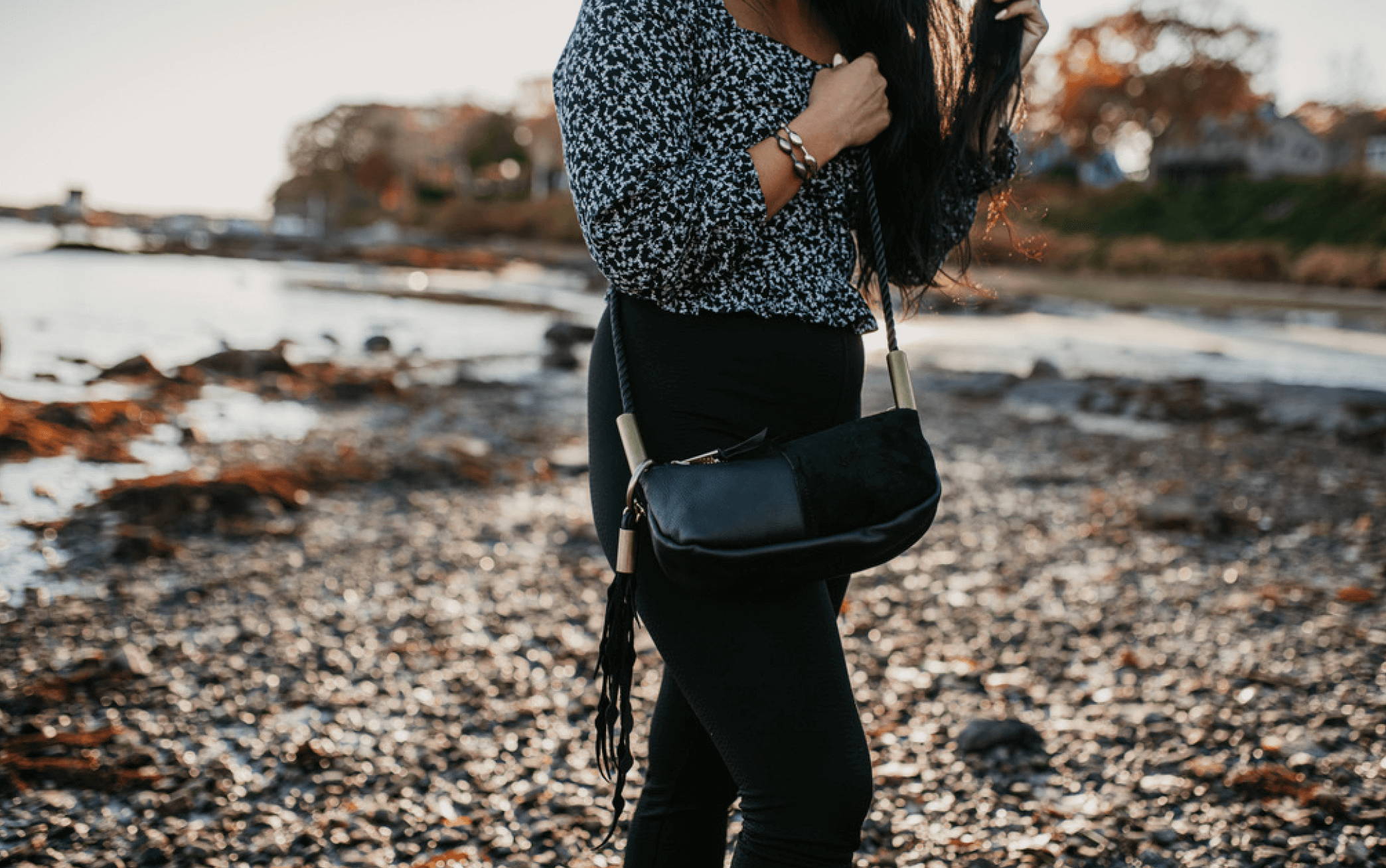 Black leather zip crossbody with seaweed tassel